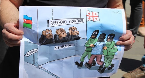 Плакат участника акции в поддержку Афгана Мухтарлы. Фото Инны Кукуджановой для «Кавказского узла»